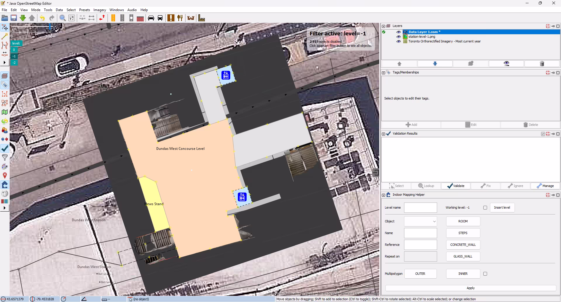 Screenshot of JOSM showing of the subway station overlaid atop satellite imagery. Basic room shapes have been traced overtop the 3D render.
